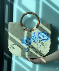 Handmade Woven Straw Bag Adorned With Floral Patterns