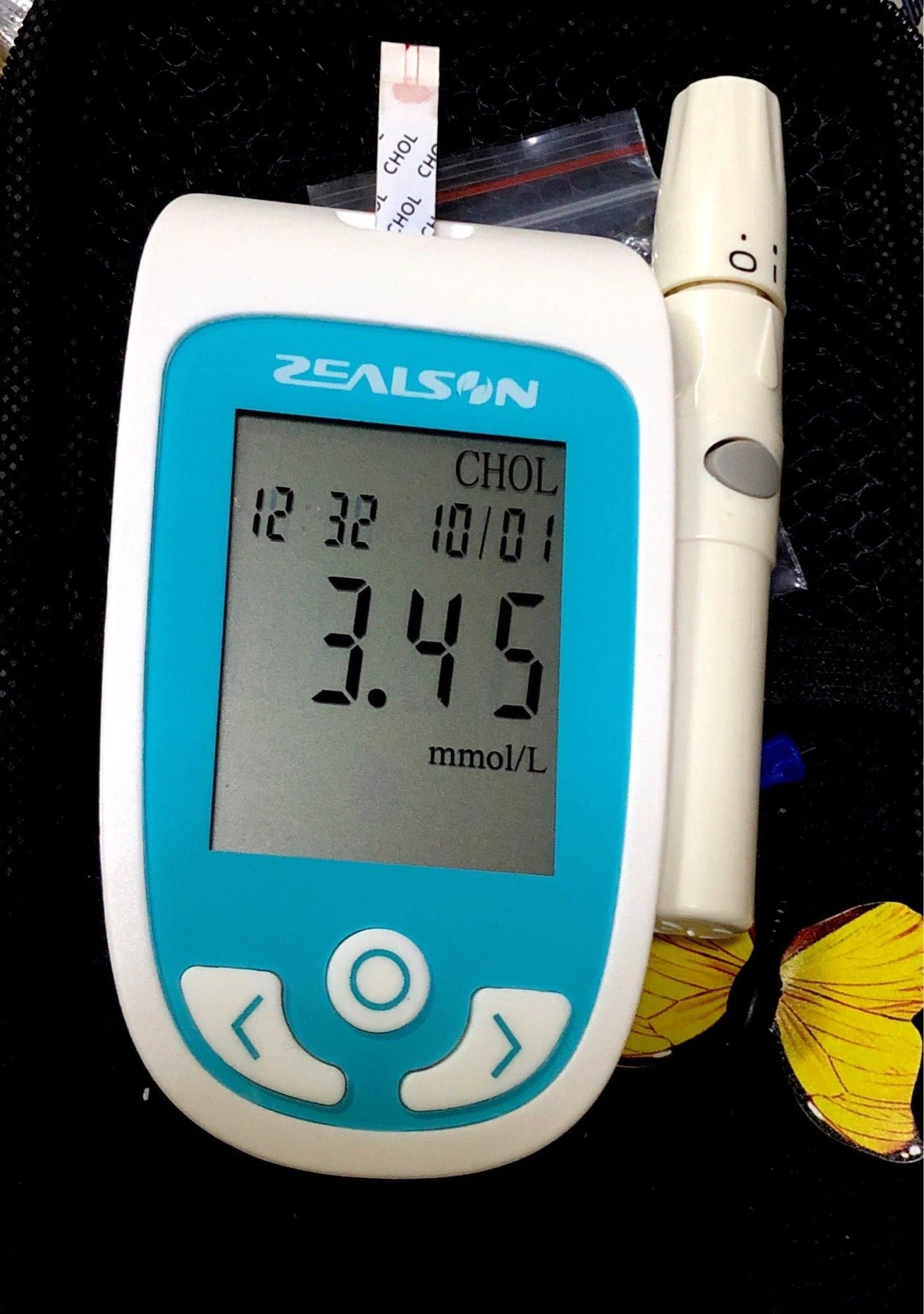 2-in-1 Monitor (Cholesterol & Uric Acid) Complete Set – Includes Lancing Device and Lancets photo review
