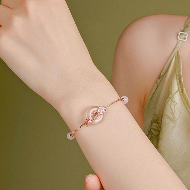 Elegant Rose Gold Bracelet with Jade and Cherry Blossom - Image 3