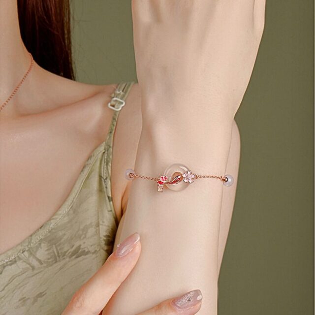 Elegant Rose Gold Bracelet with Jade and Cherry Blossom - Image 4