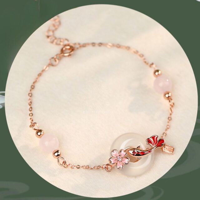 Elegant Rose Gold Bracelet with Jade and Cherry Blossom - Image 2