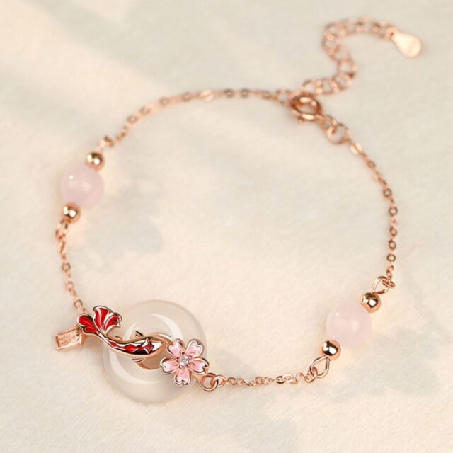 Elegant Rose Gold Bracelet with Jade and Cherry Blossom - Image 5