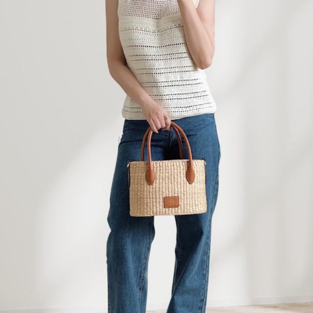 Elegant Woven Straw Handbag with Leather Handles - Image 3