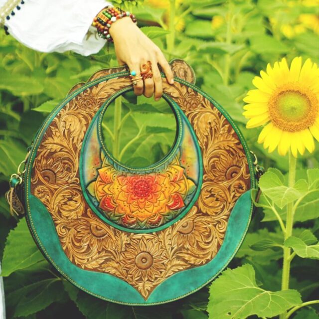 Handcrafted Circular Leather Bag with Floral Carving - Image 2